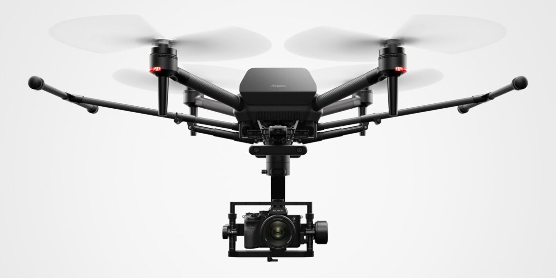 Sony Electronics Inc. has launched its first-ever professional drone, ‘Airpeak S1’. An introductory model in the new Airpeak line, the S1 is the world smallest drone. It can be equipped with a full-size mirrorless interchangeable-lens Alpha camera, opening up a new world of creative possibilities. S1 utilizes a proprietary motor, propeller, control system and sensing technology, allowing it to fly at extremely high speeds with very stable wind resistance. Additionally it features an advanced remote controller that can support the production of high-quality aerial images and freely control the aircraft. It also includes obstacle detection, automatic flight control via sensing and increased safety via cloud management of the aircraft and flight information. "Sony is excited to launch our new drone business with the Airpeak S1," said Yang Cheng, Vice President, Imaging Solutions, Sony Electronics Inc. "Combining an extremely compact size with some of Sony's most advanced imaging, sensing, AI and robotics technologies, the S1 will allow content creators, storytellers and commercial professionals to capture that which they've never been able to capture before." Airpeak S1 offers dynamic flying capabilities. This includes a maximum speed of 55mph (90kh/h), a maximum angular velocity of 1800/s, and a maximum tilt angle of 550. S1’s propulsion technology uses a combination of Sony developed key devices, which provides wind resistance in strong wind speeds up to 44.7mph (20m/s). The propulsion device and flight control system is independently developed. In addition to being lightweight, the Airpeak is highly efficient, sturdy and has a responsive proprietary 17” propeller and brushless motor. The drone is equipped with an ESC (Electric Speed Controller) for optimal control of these components. A unique, high-performance flight control system integrates the propulsion device and all sensor information to ensure stable flight and high maneuverability. S1’s stereo cameras are equipped with Sony’s image sensors and installed in five locations (front, back, left, right, bottom) of the aircraft. Sony's Vision Sensing Processor, which processes camera data at high speed and with low power consumption, and proprietary algorithms are used to accurately estimate the aircraft's spatial position and orientation in real time, enabling stable flight even in environments where GNSS (Global Navigation Satellite System) reception may be hindered, such as indoors or under bridges. The Airpeak S1 is also equipped with a unique high-performance flight control system that integrates all sensor information such as IMU (Inertial Measurement Unit), direction, barometric pressure and infrared ranging to optimize the propulsion device. The Airpeak S1 uses multi-directional sensors to enable its obstacle braking function. The front, rear, left and right stereo cameras and the infrared range-finding sensor mounted on the top recognize obstacles in the vicinity of the aircraft, allowing the aircraft to automatically decelerate and stop according to the behavior of the aircraft and the surrounding conditions. S1 provides users with the flexibility to choose the right Alpha system for their desired application to expand their filmmaking horizons. The aircraft is compatible with a wide range of camera bodies including the Alpha 7S series and FX3 for high descriptive capability with suppressed noise, the Alpha 7R series for ultra-high definition, and the Alpha 9 series and others for distortion-free images. Even the Alpha 1, which can shoot footage in 8K, is compatible. The new professional drone includes ‘Airpeak Flight’, an iOS and iPadOS compatible application that integrates the aircraft, transmitter, camera, and gimbal, allowing the operator to monitor status information such as flight distance and remaining battery power, and change various operations and settings on the screen. The new drone includes ‘Airpeak Base’, a web application that allows the operator to manage equipment, create flight plans, and manage flight logs. In the equipment management, information on the equipment used is automatically listed and managed based on the flight log. This allows the operator to check the condition of the aircraft before going to the field, minimizing on-set issues. All aircraft information, including logs, can be uploaded to the cloud via the mobile app Airpeak Flight. Airpeak Base allows users to check the status of the aircraft and can provide notifications if necessary. Users can manage the status of all managed aircraft in one place before flight. Past flight logs can be viewed on the logbook screen, and details such as in-flight errors can also be reviewed.