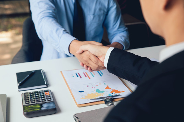 business people shaking hands