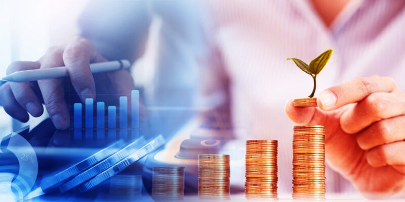 hands holding pen and coin